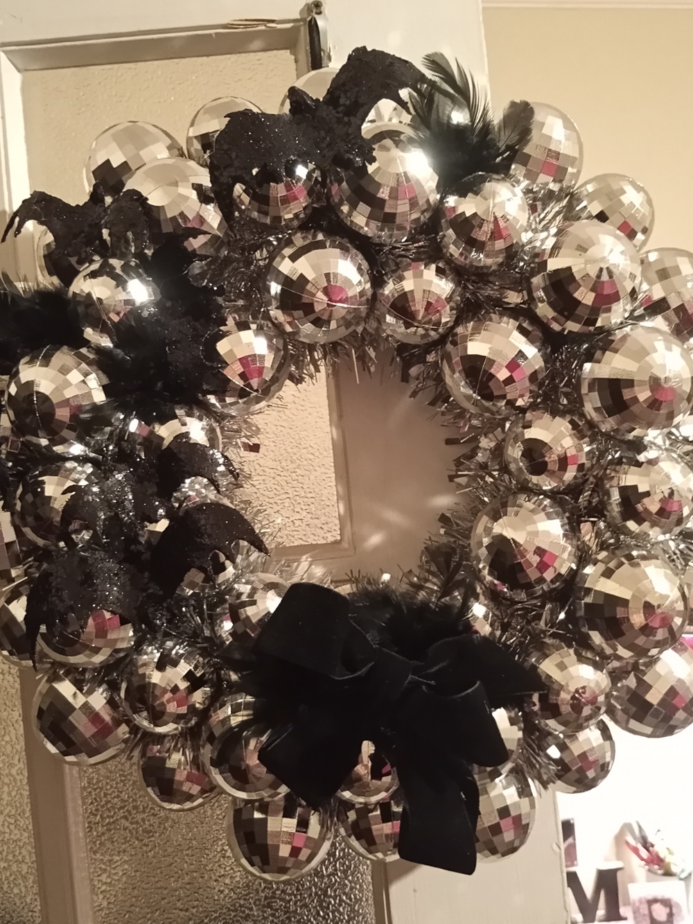 Festive Silver Disco Ball Wreath with Black Accents